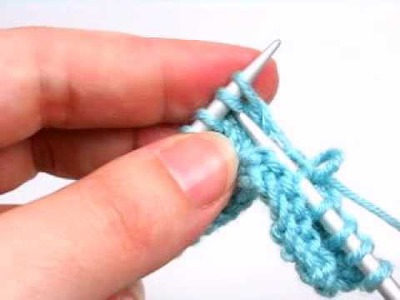 Hacer dos puntos juntos  (2pjun).  Knit two stitches together( K2tog)