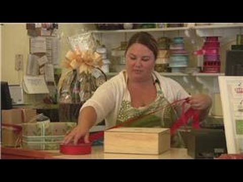 Gift Wrapping Tips : How to Tie a Ribbon Around a Box