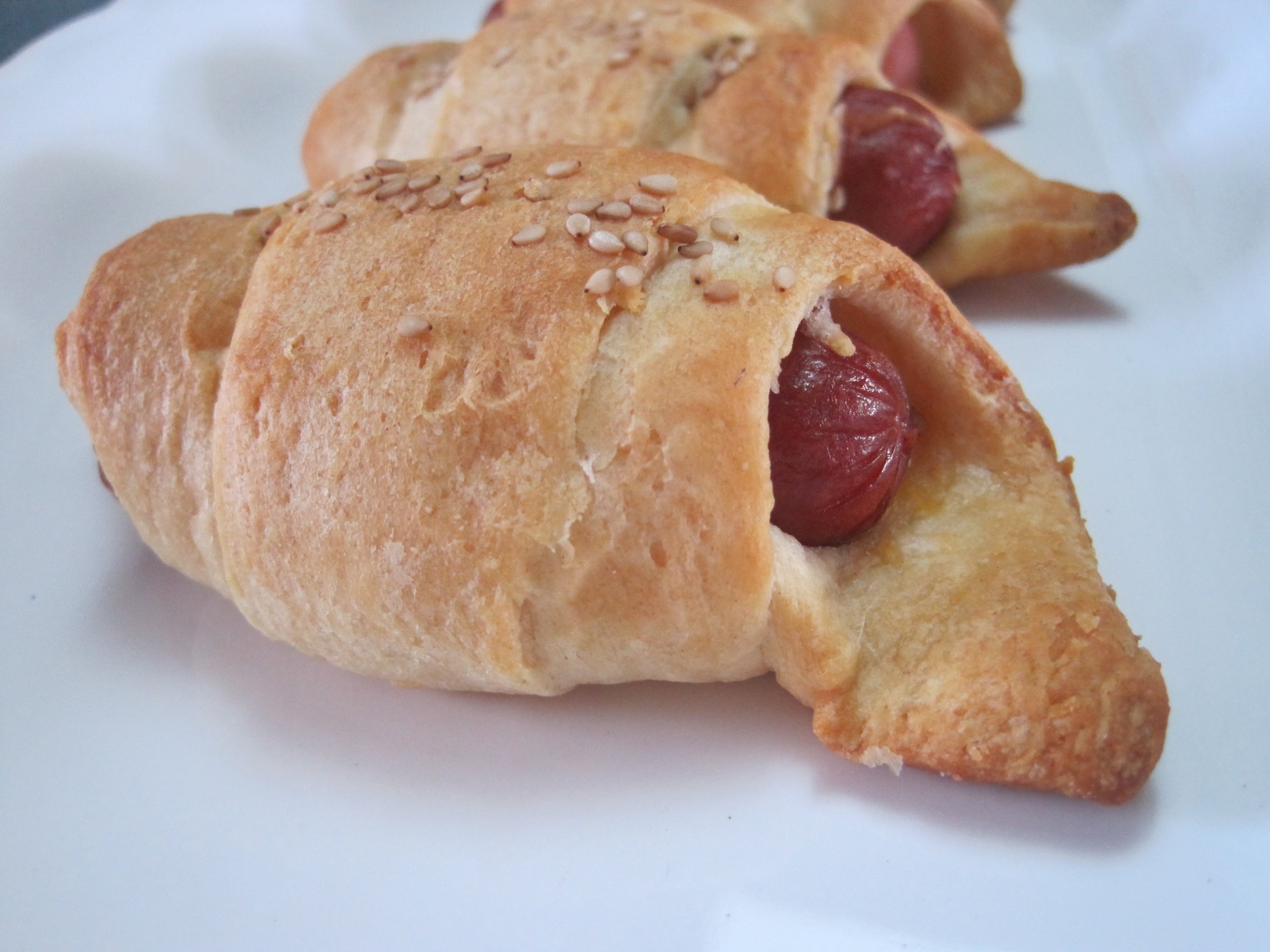 How to make PIGSinaBLANKET HOTDOGS, CHEESE rolled up in CRESCENT DOUGH