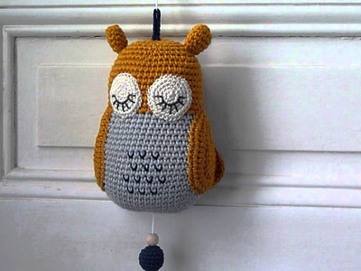 Musical Soft Toy "Little Owl". crochet. yellow mustard, blue grey