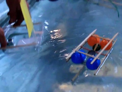 Rubber band powered water craft