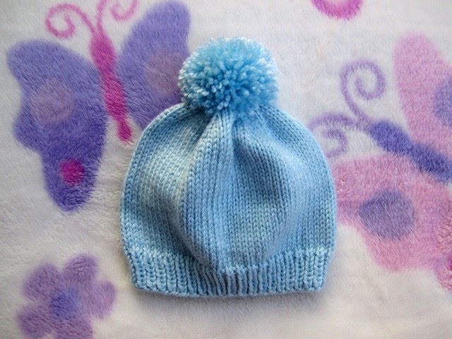 How to make a pom pom and fix on the hat.