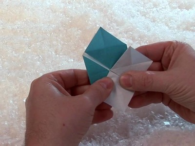 How to make an origami snowflake.