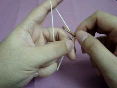 Holding yarn and hook