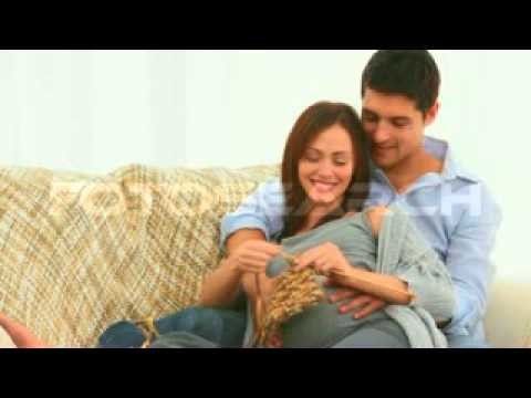 Pregnant Woman Knitting With Husband