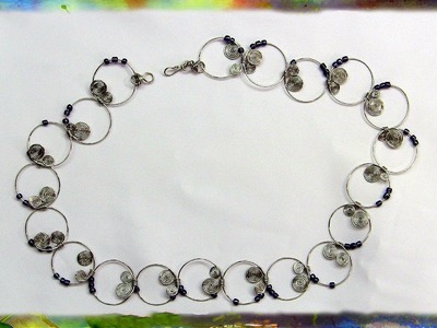 How to Create the Beautiful Spiral Hoop Necklace with Purple Beads by Ross Barbera