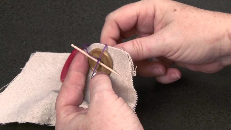 Sewing On A Four-Hole Thread Shank Button