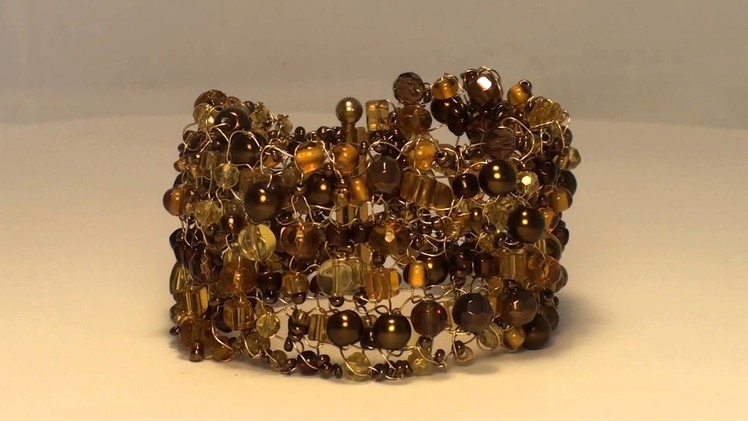 Handcrafted Knitted Wire Bracelet with Brown and Gold Coloured Glass Beads and Seeds.m2ts