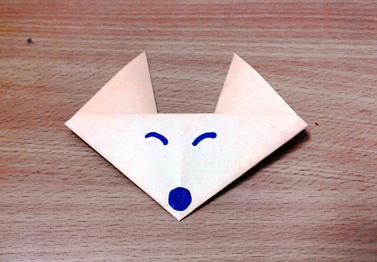 How to make an origami fox face step by step.