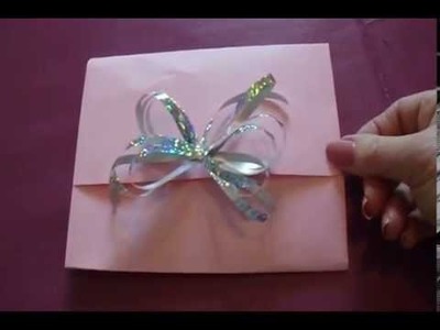 Diy wrap a small package no cutting taping or gluing