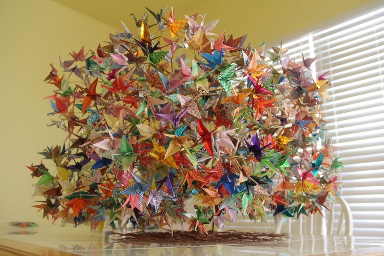 Construction of 1000 origami folding paper cranes on a wired tree