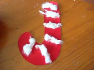 Christmas - Arts and Crafts simple kids activity: Candy-cane with red paper and white cotton.