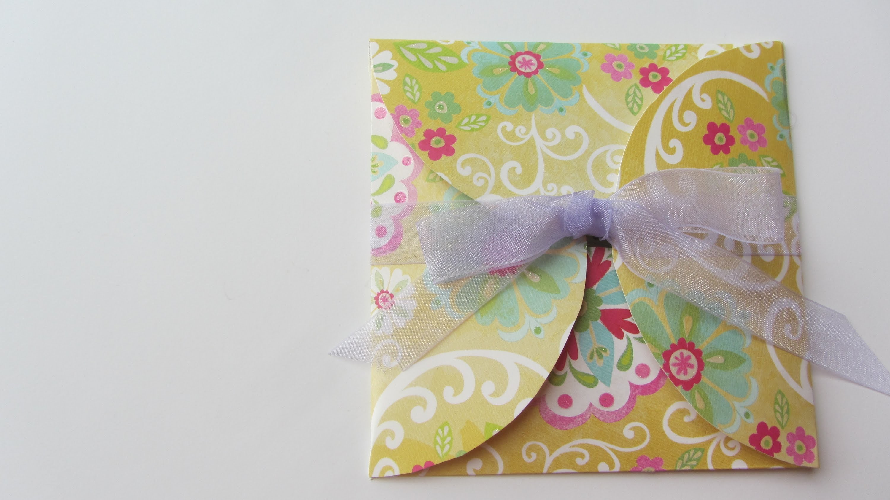 How to Make a Fun CD DVD Envelope With Scrapbook Paper and a CD as Pattern