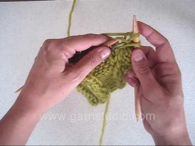 DROPS Knitting Tutorial: How to knit a cable without a cable needle