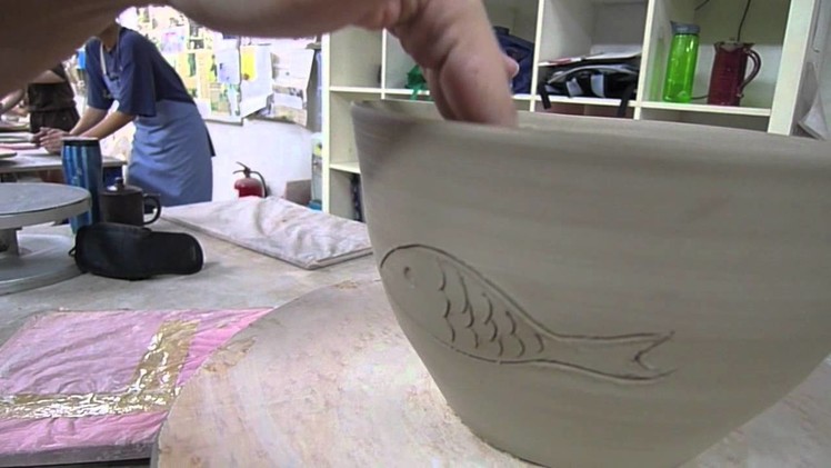 Making a 3D drawing on a pot - Clay Craft Malaysia