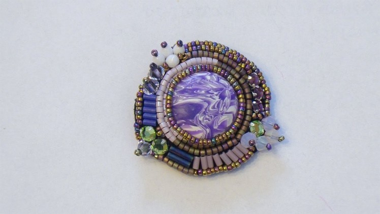 BeadsFriends: Beaded embroidery pin with polymer clay cabochon, bugles and Swarovski bicones