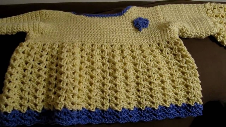 Crochet child's sweater with Teresa's crochet round pouch