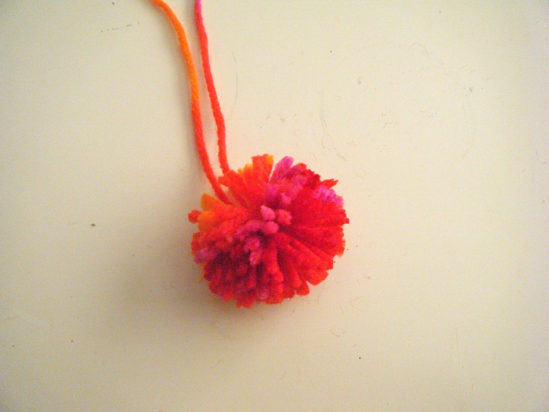 Crafting Hack How To Make Pom Poms Out Of Yarn With This Easy Method - tkwe9gk