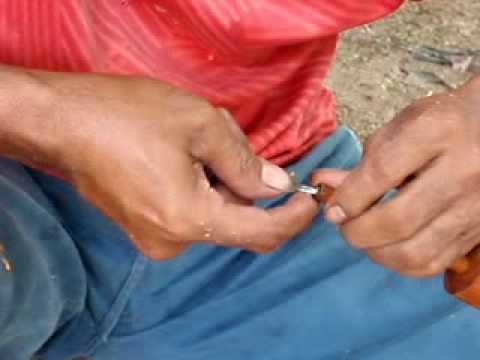Firepiston construction 2, demonstrated by a native Semelai. Part 2 of 2