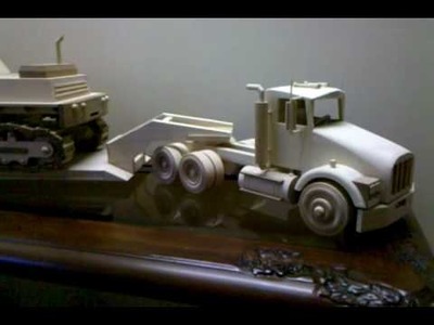 Hand-made track-hoe and tractor trailer.