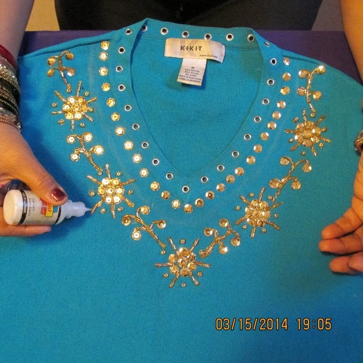 GORGEOUS SHIRT DECORATION WITH SEQUINS, BEADS AND GLITTER PAINT.