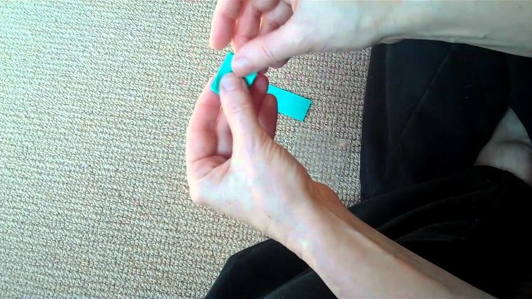 How to attach a magnetic snap to ribblon backing for knitted items