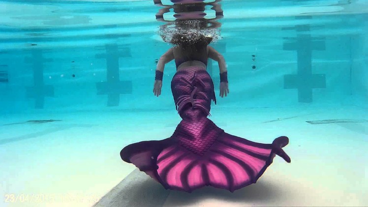Swimming behind a mermaid short