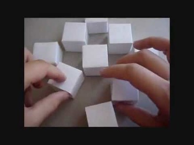 YouTube - How to make the origami moving cubes.flv