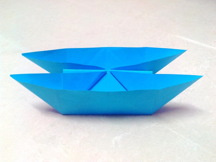 How to make an origami catamaran boat step by step.