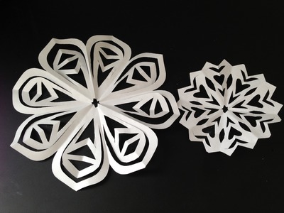 DIY hand cut paper snowflakes. paper doilies - Natalie's Creations
