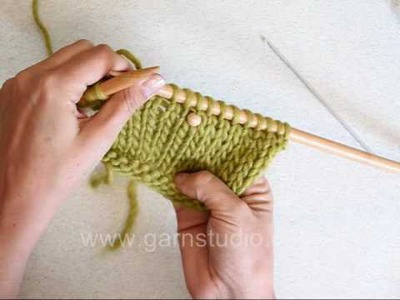 DROPS Knitting Tutorial: How to add a single bead or two