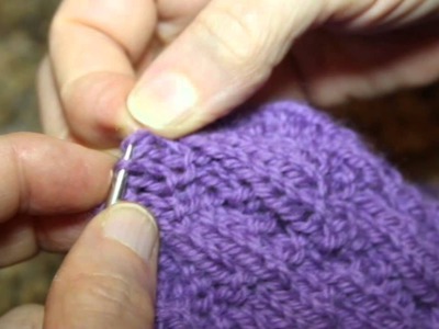 How to fix a (serious) mistake by unraveling the knitting and reclaiming the live stitches.