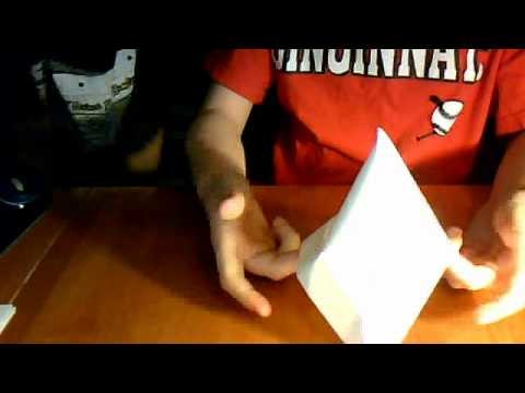 How to make an origami sailor hat.canoe boat