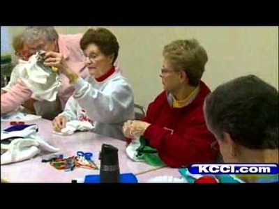 Group Crafts T-Shirts Into Diapers For Haiti