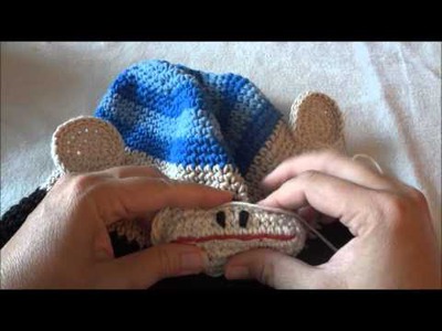 How to attach a sock monkey mouth to crochet or knit hat