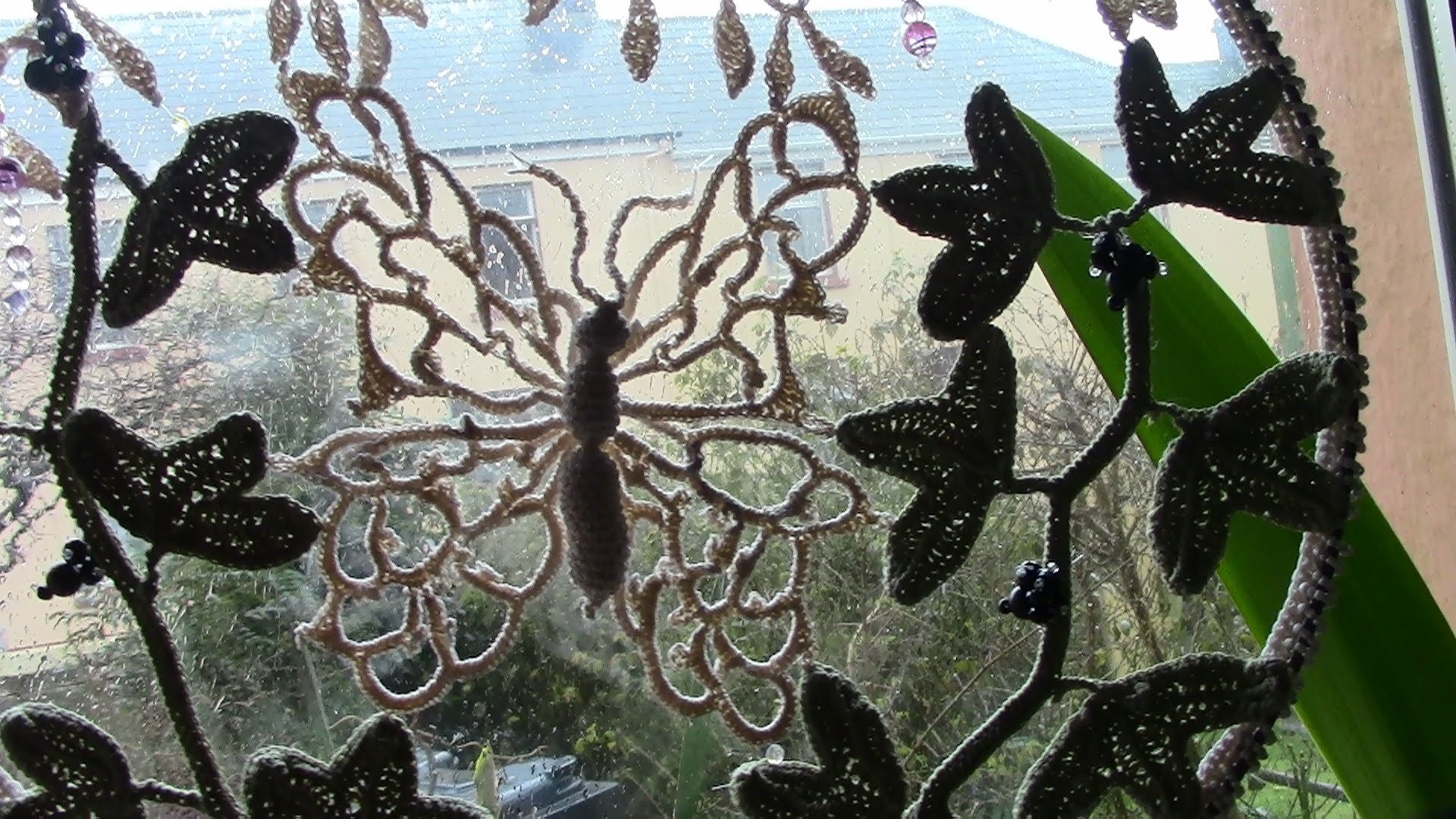 A butterfly Crochet Suncatcher