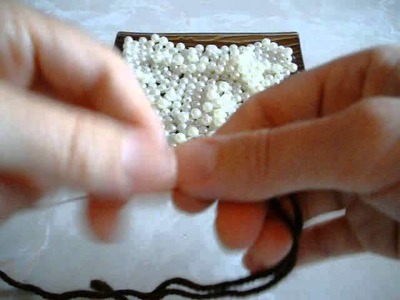 How To String Beads Onto Yarn.wmv
