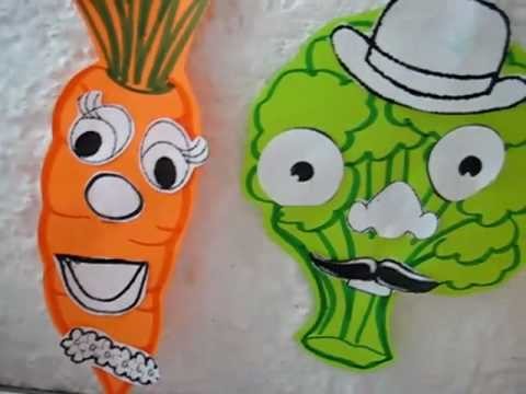 Arts & Crafts activity, Foods theme: Mrs. Carrot and Mr. Broccoli color paper face shapes.