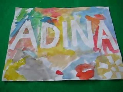 Arts & Crafts activity: Name posters using masking tape and paint.