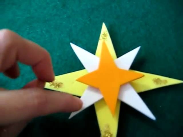 Christmas. Arts and Crafts activity: Pop-up stars decorations made from color paper or foamies.