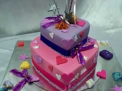 GURU CHEF ROHAN CRAFTS A 2 TIER HEART SHAPE CAKE WITH A PRINCESS THEME