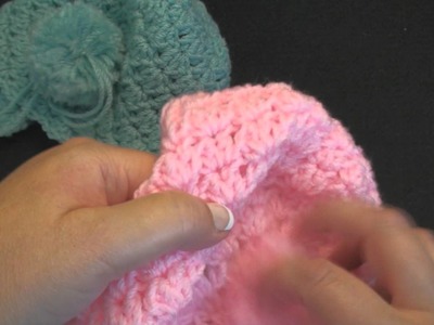 Simple Crochet - How to Sew a Yarn Pom Pom or Yarn Ball to the top of a Cap