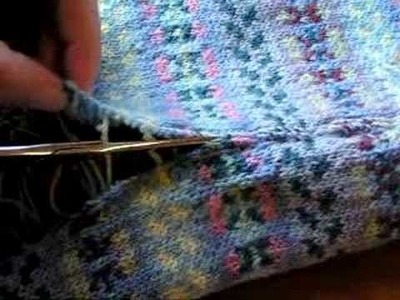 Cutting a steek, in a Knitted Fair Isle baby blanket