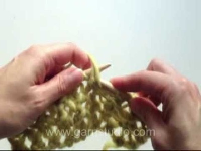 DROPS Knitting Tutorial: How to knit a simple lace pattern. P2 tog, yo: