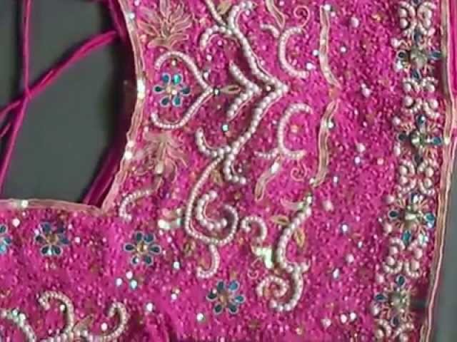 Dark Pink Bridal lehenga choli designed with pearl moti work - Figura Fashion