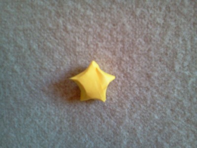 How to make an origami lucky star - Como hacer una estrella de cinco puntas de papel