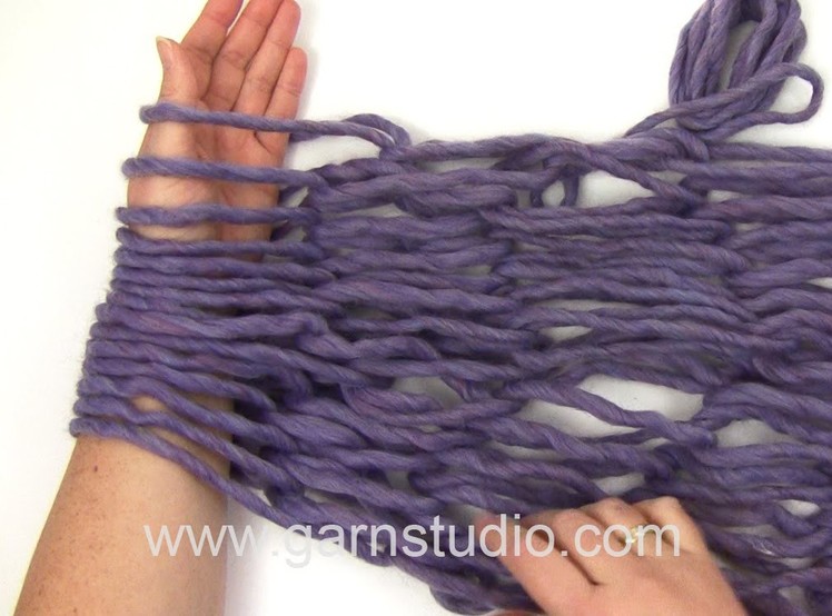 DROPS Knitting  Tutorial: How to Arm Knit.