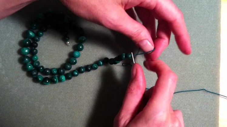 Create a knot between beads