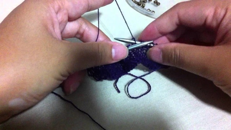 Knitting with beads - inserting beads using small crochet hook