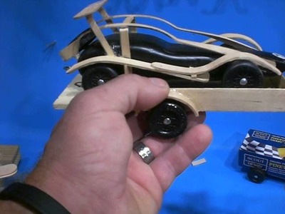 Craft Sticks attached to Pinewood Derby Cars